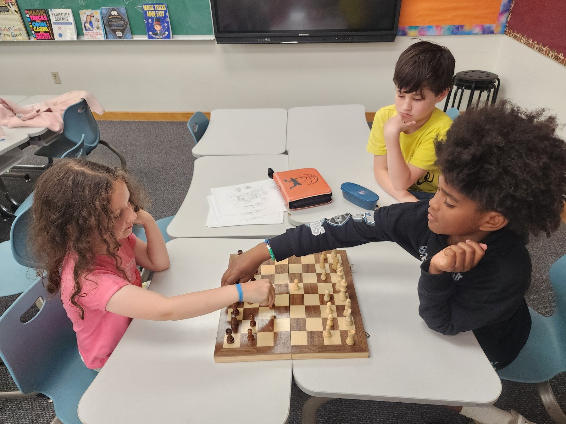 Campers playing chess together