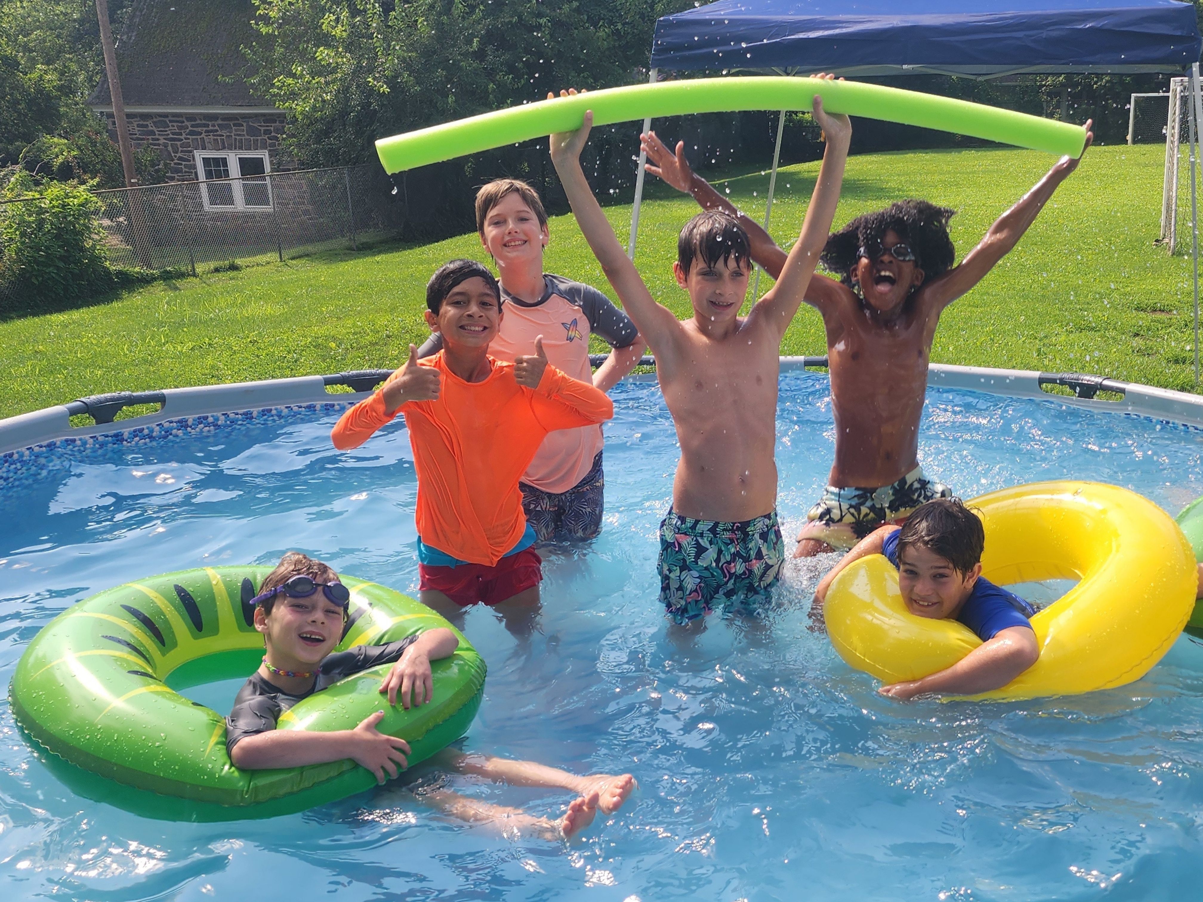 Campers enjoying active outdoor water games